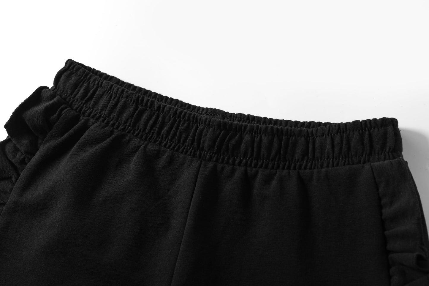 SHORT VOLANTE