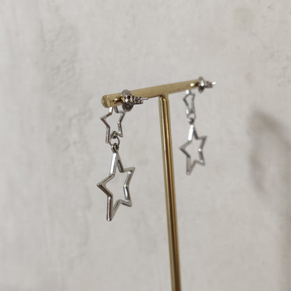 PENDIENTE DOBLE ESTRELLA PLATA